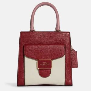 Coach red & pink mini pepper crossbody purse